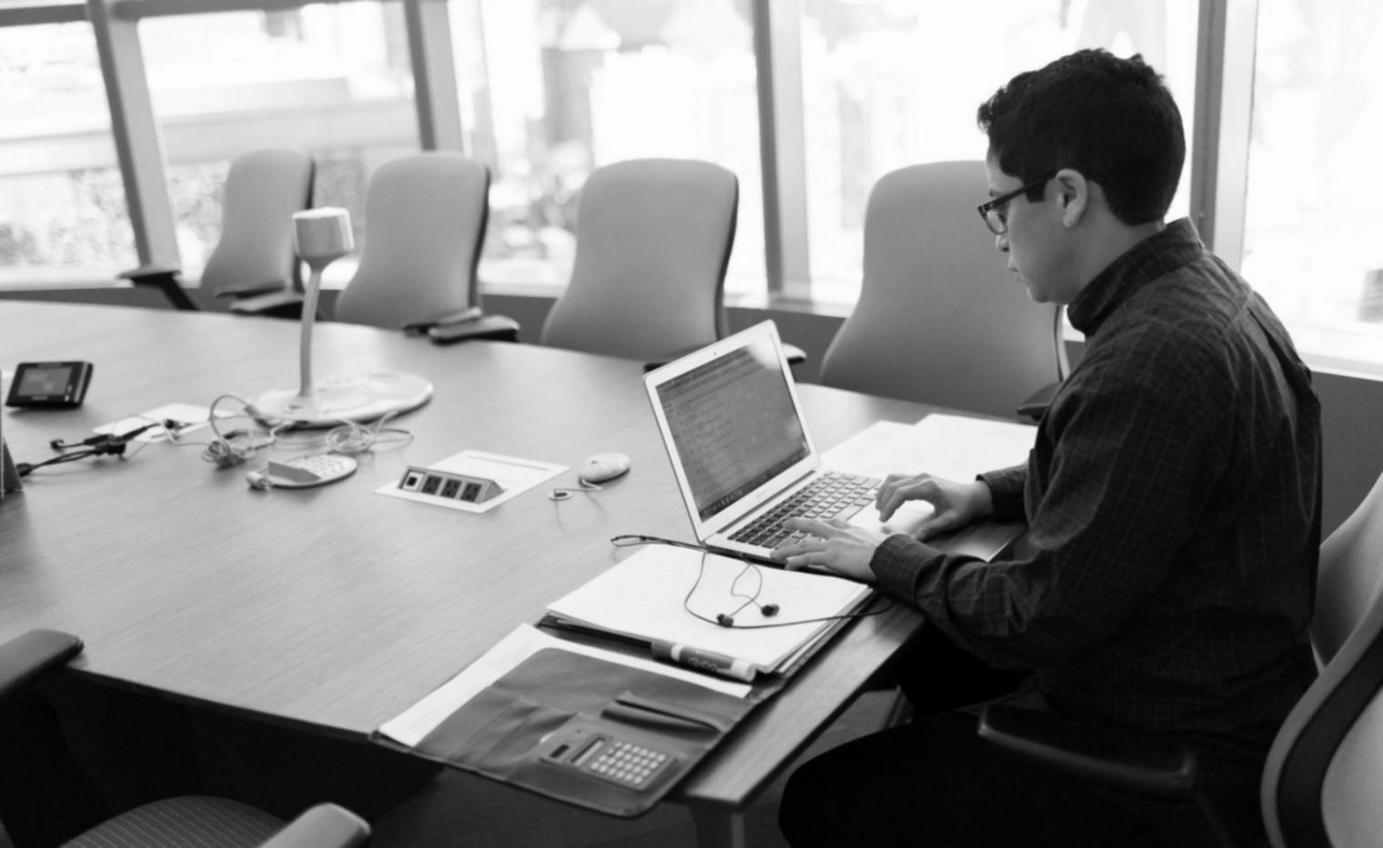 Early Python workshop sessions with small groups learning practical coding